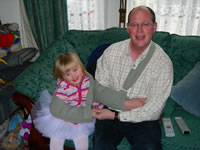 Stephanie consoles Daddy by wearing a sling too!