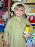 Charlotte tries on Mummy's old hat and coat
